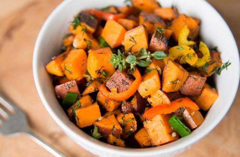 Sweet Potato Hash with Fresh Herbs, sliced sausage, Peppers and Onions