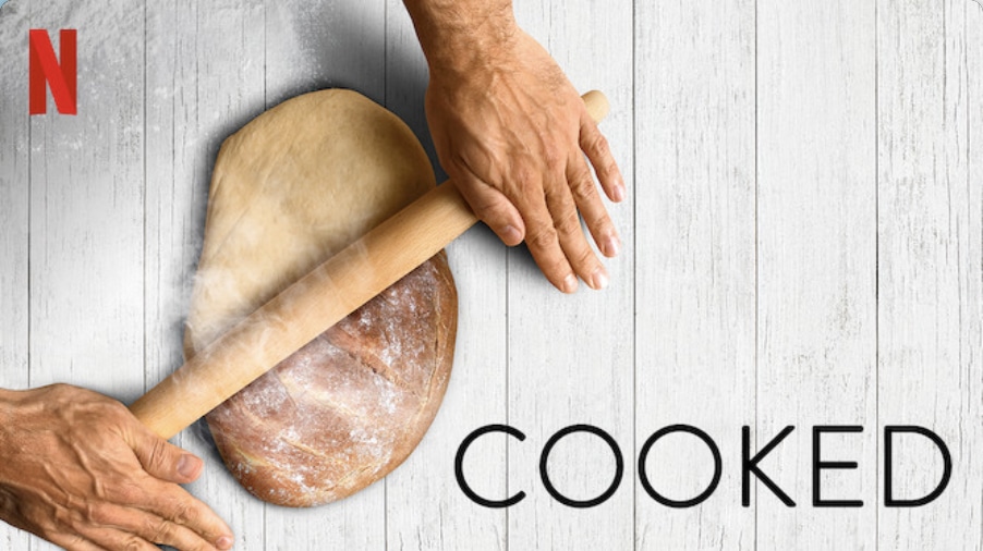 Cooked's thumbnail image with a dough and bread pin on a white wooden background