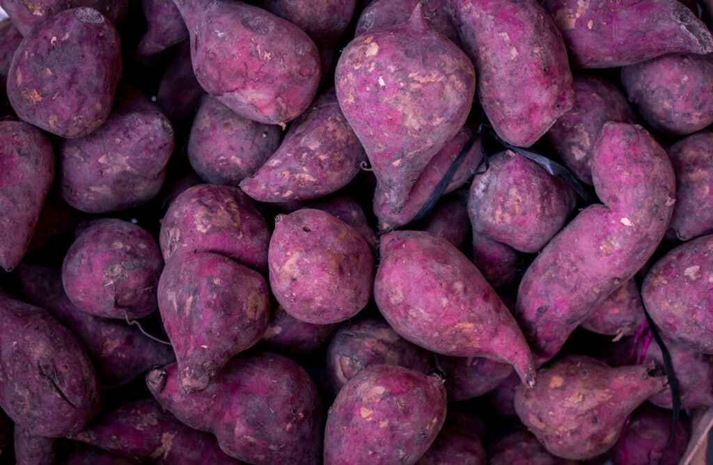 sweet purple potatoes, sweet potatoes background.