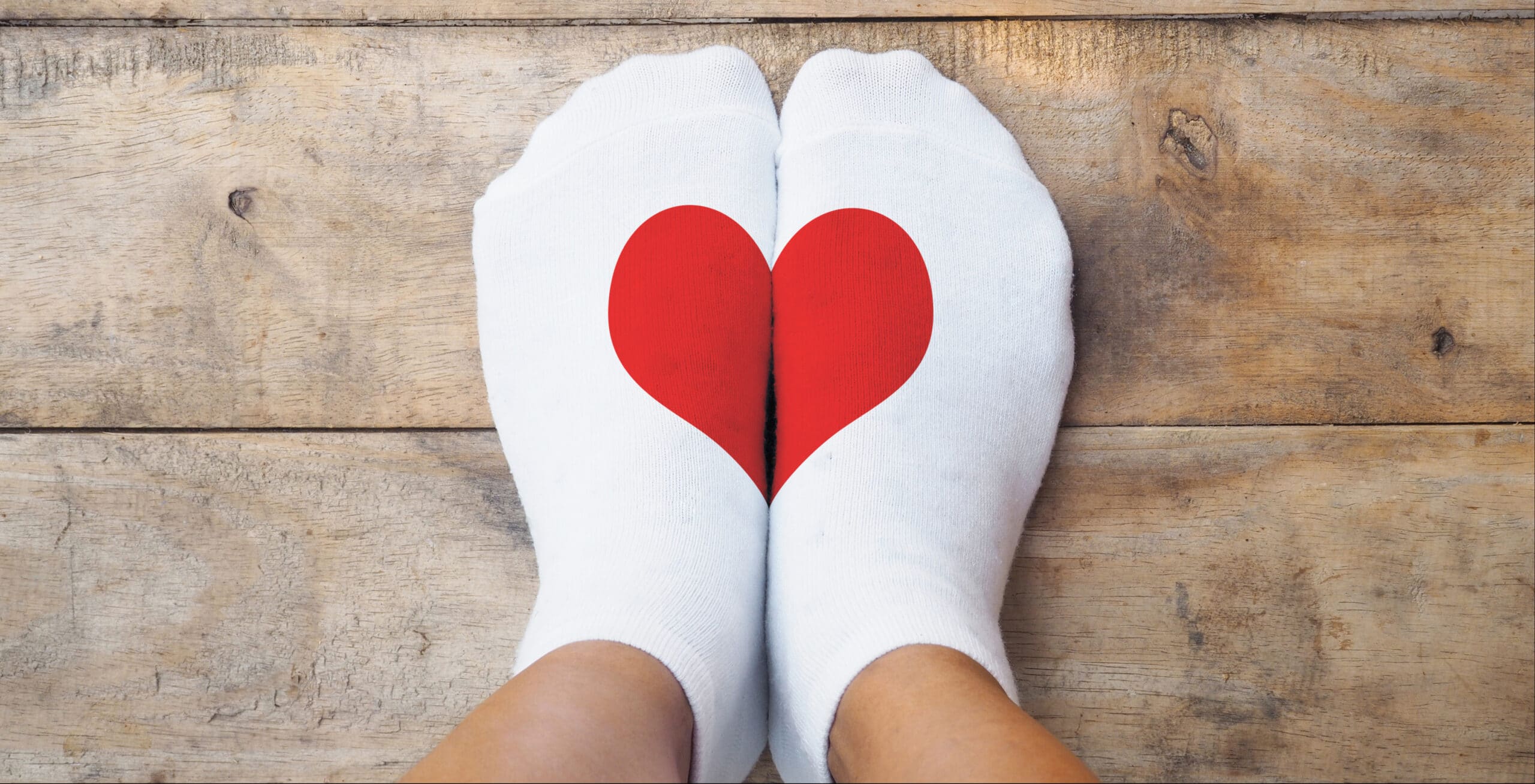 love yourself photo of socks with heart