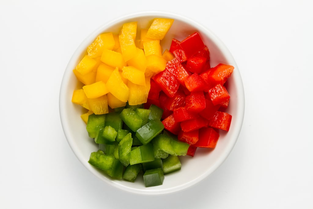 Sliced yellow, red, and green bell pepper